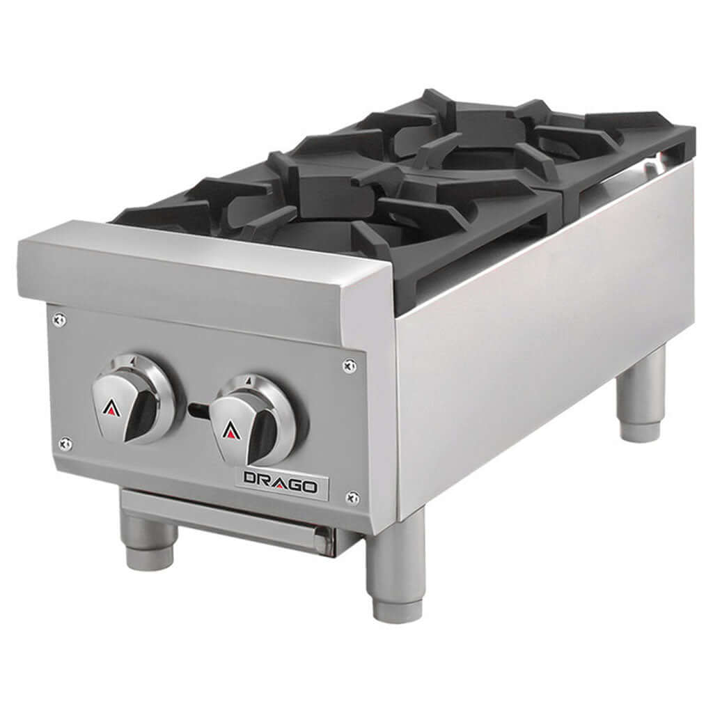 Detalle de quemadores y perillas metalicas de la parrilla industrial Drago CG-20